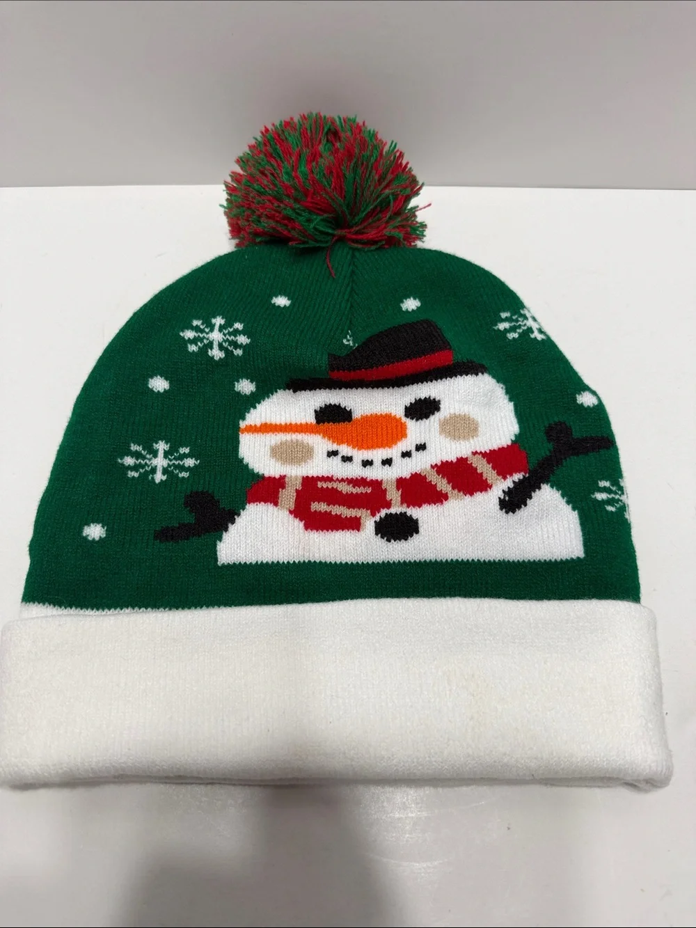 Green Holiday Light Up Snowman Pom-Pom Beanie Hat with 'HO HO' Cuff